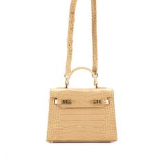 DESIGN
The stunning Kim shoulder bag is perfect for adding a dash of chic to any ensemble. Made in Italy from croco embossed calf skin, this versatile piece has an intriguing look, that will complete any style in a memorable way. This style can be used as a handbags or a shoulder bag, taking you from day to evening with ease.
DESCRIPTION
Made In ItalyCroco embossed leather with matching trimMicrofiber interiorGold-toned detailing
DETAILS
8.6"h x 4"w x 11"l3.4" handle drop35" to 47" detachable/ad Teddy Blake, Free Giveaway, Kate Spade Crossbody, Luxury Handbags, Embossed Leather, Italian Leather, Leather Handmade, Luxury Branding, Calf Skin