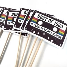 the best of 1989 stickers are lined up on top of each other with toothpicks in front of them