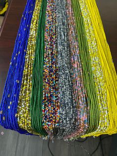 These wholesale waist Beads are between 40"- 50" They are all traditional waist beads with no crystals They are mostly Sizes 8/0 beads All Tie Ons Beads will be mixed and matched for you. If you want specific designs, then send me screenshots Traditional Waist Beads With 108 Beads, Traditional Multicolor Beaded Waist Beads, Multicolor Polished Round Waist Beads, Multicolor Polished Waist Beads, Traditional Colorful Waist Beads, Traditional Waist Beads With Beaded Chain, Bohemian Multicolor Polished Waist Beads, Multicolor Beaded Chain Waist Beads, Multicolor Round Beaded Chain Waist Beads