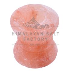 an orange plastic object with the words himalayan silt factory on it's side