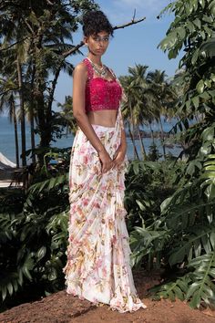 White pre-draped floral pattern saree. Paired with a pink mirror and cutdana cutwork embroidered padded blouse. - Aza Fashions Bollywood Style Fitted Pre-draped Saree With Floral Print, Fitted Pre-draped Saree With Floral Print For Festive Occasions, Summer Reception Pre-draped Saree, Summer Georgette Pre-draped Saree For Reception, Fitted Pre-draped Saree With Floral Print, Summer Traditional Georgette Pre-draped Saree, Wedding Georgette Pre-draped Saree With Floral Print, Party Blouse With Floral Print And Traditional Drape, Elegant Summer Saree With Floral Print