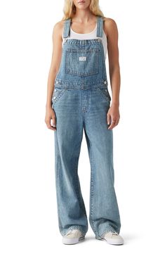 Revive a childhood favorite with roomy overalls cut from perfectly faded denim. Adjustable buckle straps; side button closures Bib pocket; front slant pockets; back patch pockets 100% cotton Machine wash, tumble dry Imported Oversized Overalls Outfit Fall, Overalls With Flannel, Overalls Halloween Costume, Oversized Overalls Outfit, 90s Overalls Outfit, Over Alls, Denim Overalls Outfit, Overall Outfits, Oversized Overalls