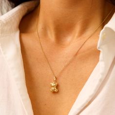 14K Gold Teddy Bear Necklace, Teddy Bear Pendant, Mama Bear Necklace D E T A I L S * Gold KT: 14K Hollow Gold * Gold Color: Yellow Gold Dimensions: Height: 13 mm  Width: 10 mm Chain Style: Rolo S H I P P I N G & R E T U R N S * Ready to Ship in 1-2 Business Days * FREE shipping on all U.S. orders  * Packed in labeled gift box C O N T A C T Contact us with any inquiries by Etsy convo! S H O P Check out my shop https://www.etsy.com/shop/DesignGoldJewelry Go Directly to My Sections: - Chains -  htt Gold Inspo, Teddy Bear Jewelry, Bear Design Pendant Jewelry As Gift, Teddy Bear Bracelet Gold, Gold Teddy Bear, Teddy Bear Necklace, Teddy Bear Necklace Gold, Mama Bear Necklace, Teddy Bear Pendant