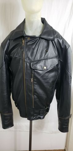 This is a pre-owned Men's USA Bikers Dream Apparel Genuine Leather Waist Length Lined Coat/Jacket. This jacket is a size 54 and is braided . This jacket has a neck wrapper and removable quilted lining. The jacket outer shell is 100% genuine leather and the lining is 100% Nylon. The padding is 100% polyester. This jacket is in very good condition with no rips, tears, holes, or stains. The leather is in very good condition. Please view all photographs for additional details and condition issues. & Vintage Outdoor Biker Jacket With Zipper Closure, Vintage Biker Jacket With Zipper For Outdoor, Vintage Biker Jacket With Zipper Closure For Outdoor, Braided Leather, Waist Length, Genuine Leather, Coats Jackets, Braids, Leather Jacket