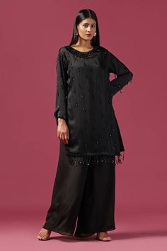 Black kurta with cutdana, tassel embellishment. Paired with palazzo. - Aza Fashions Elegant Palazzo Set With Tassels, Elegant Festive Palazzo Set With Tassels, Elegant Eid Sets With Tassels, Designer Elegant Sharara With Tassels, Elegant Designer Wear Sharara With Tassels, Traditional Palazzo Set With Tassels For Party, Traditional Tassel Palazzo Set For Parties, Black Embellished Palazzo Set For Eid, Black Palazzo Set For Evening Eid