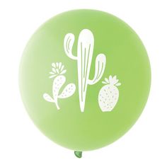 a lime green balloon with white cactus and pineapples on it