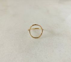 Enjoy this statement piece that will be made to order just for you! Available in gold filled, sterling silver and 14k gold. The band is 1.3mm Open circle is 1.3mm thick and approx. 15mm in diameter. Adjustable Round Midi Rings In Recycled Gold, Handmade Delicate 14k Gold Rings, Dainty 14k Gold-filled Round Band Ring, Gold Dainty Ring With Round Band, Adjustable Recycled Gold Midi Rings, Dainty 14k Gold Filled Rings, Handmade 14k Rose Gold Midi Rings, Delicate Handmade 14k Gold Rings, Simple Recycled Gold Ring Jewelry