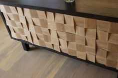 a large wooden dresser sitting on top of a hard wood floor