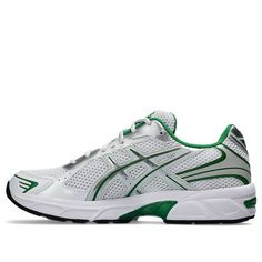 The ASICS GEL-1130 sneakers offer a classic retro sports style. Featuring a white mesh upper with silver and green accents, these shoes provide a comfortable fit with soft padding around the ankle. The GEL-tech cushioned midsole delivers essential comfort, while the durable rubber outsole ensures grippy traction.  Complete with iconic ASICS branding, these sneakers are a stylish and functional choice. Asics Sporty Running Shoes With Vented Sides, Sporty Asics Running Shoes With Vented Sides, Asics Silver Sporty Sneakers, Asics Running Shoes With Vented Sides For Light Sports, Silver Asics Sneakers For Sports, Asics Silver Sneakers For Sports, Asics Breathable Mesh Sneakers, Asics Mesh Sneakers For Jogging, Breathable Asics Mesh Sneakers