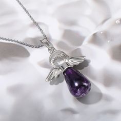 PLEASE NOTE: Our crystal stones are natural minerals and each crystal is unique. The internal ice cracks, pits, mineral points, and color differences of natural crystals are all formed naturally and are normal phenomena, which will not affect the efficacy, beauty and value of the crystal at all.This amethyst angel pendant is a beautiful piece and a great way to feel the positive energy of amethyst at all times. Amethyst is considered very soothing, helping to heal the body and mind. It is also c Spiritual Drop Gemstone Crystal Necklace, Amethyst Birthstone Pendant Crystal Necklace, Spiritual Amethyst Crystal Necklace Gift, Spiritual Crystal Necklaces For Healing, Spiritual Healing Crystal Necklaces, Teardrop Crystal Stones Necklace For Gift, Gift Lavender Crystal Necklace With Gemstone Beads, Amethyst Crystal Pendant Necklace Gift, Amethyst Pendant Crystal Necklace Gift