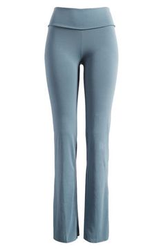 These go-to lounge pants from Kim Kardashian's SKIMS line are cut from soft cotton jersey with a deep fold-over waist. 32" inseam; 19" leg opening; 10" front rise; 13 1/2" back rise (size Medium) 90% cotton, 10% spandex Machine wash, dry flat Imported Comfort Waistband Solid Yoga Pants, Stretch Wide Leg Yoga Pants For Loungewear, Fitted Cotton Yoga Pants For Workout, Versatile Stretch Bottoms For Lounging, Versatile Stretch Pants For Lounging, Relaxed Fit Elastane Activewear For Loungewear, Comfort Stretch Full Length Lounging Bottoms, Versatile Fitted Bottoms For Lounging, Comfort Stretch Elastane Yoga Pants