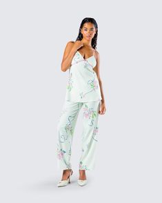 Be the babydoll of their dreams in this floral print cami top 💐 Made from plain weave woven fabric, this floral print cami top is complete with piping and adjustable straps for the perfect subtle, yet flowy look 💙 Floral Print Vacation Camisole, Floral Print Camisole For Vacation, Vacation Floral Print Camisole, V-neck Sleepwear With Delicate Straps For Spring, Feminine Floral Print Camisole For Spring, Spring Floral Print Camisole, Spring Floral Camisole, Spaghetti Strap Camisole For Spring Loungewear, White Floral Print Sleepwear With Spaghetti Straps