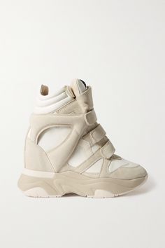 While the concealed wedge on Isabel Marant's sneakers isn't immediately obvious, the leg-lengthening effects definitely are. A signature of the designer's, this high-top pair is made from leather and suede. High Top Wedge Sneakers, Isabel Marant Sneakers, Isabel Marant Shoes, Puma Fierce Sneaker, Wedge Sneakers, Sneaker Wedge, Sneakers Boots, Mr Porter, Wedge Sneaker