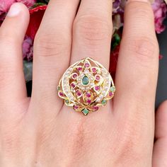 Featuring a jadau ring made in 22ct gold and embellished with rubies, emeralds and pearls. The ring weighs 4.6 GMs Price Breakup Summary Component Rupees % of Total 22k Gold 21,912 72.8% Stones & Beads 2,376 7.9% Making Charges 3,944 13.1% Taxes (GST) 847 3.0% Total 30,079 100.0% View Detailed Price Breakup Watch Video Here Traditional Ruby Ring In Yellow Gold, Traditional Gold Emerald Anniversary Ring, Traditional Yellow Gold Ruby Ring, Traditional Hallmarked Ruby Ring, Elegant Ruby Ring For Festive Occasions, Traditional Oval Ring With 17 Jewels, Traditional Yellow Gold Ruby Ring With Gemstone, Traditional Yellow Gold Ruby Ring For Wedding, Traditional Ruby Rings For Ceremonial Occasions