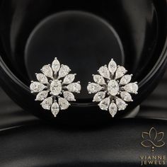 Experience the epitome of elegance with our 6.41 total carat weight earrings, masterfully crafted with lab-grown diamonds. Featuring a harmonious blend of three timeless cuts - the classic oval, the slender marquise, and the graceful pear, these earrings embody both modern innovation and ageless sophistication. Set in a design that accentuates each unique shape, they offer brilliant sparkle and unparalleled beauty. An eco-friendly choice, our lab-grown diamonds promise the same brilliance as mined diamonds but with a more sustainable footprint. These earrings are not just a piece of jewelry, but a statement of style and ethics, perfect for any discerning jewelry aficionado. 💎 EARRING Features: → Shape: OVAL CUT,MARQUISE CUT, PEAR CUT → Carat: 6.41 TCW → Color: G+ → Clarity: VS+ As the lis Luxury Marquise Cut Diamond Earrings For Formal Events, Luxury Marquise Formal Earrings, Luxury Pear-shaped Diamond White Cluster Earrings, Luxury Marquise Cut Cluster Earrings For Formal Occasions, Luxury Marquise Cut Earrings For Formal Occasions, Luxury Pear-shaped Cluster Earrings For Formal Occasions, Luxury Pear-shaped Cluster Earrings For Formal Events, Formal Marquise Cut Diamond Bridal Earrings, Luxury Oval Cluster Earrings For Formal Occasions