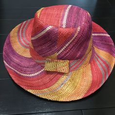 Nwot Colorful Straw Sun Hat W/Adjustable Band Brand New, Never Worn! Purchased At An Art And Farmer’s Market In Florida, Put In Suitcase Home And Never Wore It. This Hat Does Fold For Easy Transport Has Adjustable Ties Inside Very Colorful Straw Hat! Orange, Purple, Red, Yellow, Blue Adorable Faux Bow On Back. Ships Same Or Next Day From A Smoke And Pet Free Home. Multicolor Straw Hat For Spring, Multicolor One Size Straw Hat For Spring, Multicolor Flat Brim Summer Hat, Multicolor Fedora Straw Hat, Colorful Sun Hat With Curved Brim For Spring, Multicolor One Size Fedora Straw Hat, Adjustable Multicolor Casual Sun Hat, Multicolor One-size Fedora Straw Hat, Casual Adjustable Multicolor Sun Hat