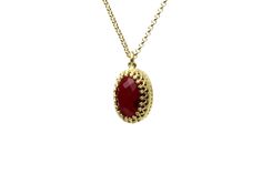 "Vibrance and intricacy come together in this elegant Garnet pendant necklace. A handcrafted gem necklace masterpiece you can flaunt everyday. This piece from our collection of birthstone necklaces will be an ideal gift for a January-born lady. ♥ Gemstone Type - Garnet (Lab Created) ♥ Gemstone Size - 10x14mm ♥ Gemstone Cut - Oval - More options available in the drop down menu ♥ Metal Type (Main Photo) - 14k Gold Filled - More options available in the drop down menu ♥ Length (Model Photo) - 45cm/ Luxury Oval Pendant Necklace For Gift, Elegant Oval Cabochon Pendant Necklace, Oval Pendant Necklaces With Cabochon For Wedding, Faceted Oval Pendant Necklace For Gift, Oval Pendant Cabochon Necklace For Wedding, Fine Jewelry Gold Oval Cabochon Necklace, Oval Cabochon Pendant Necklace For Weddings, Gold Oval Cabochon Necklace In Fine Jewelry Style, Handmade Yellow Gold Necklace With Oval Cabochon