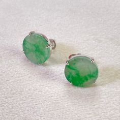 The emerald green jadeite disc earrings is made from natural real Burmese jadeite stone and genuine diamond. They are handmade items. This new collectable item is finished by our experienced designer that outlines the exceptional quality of natural jadeite and diamond by superior craftmanship. This is the perfect gift for mom, wife, fiancée, girlfriend, valentine, daughter, family or friend. It is a special gift for mother's day, valentine's day, wedding, anniversary, birthday, Christmas, Easter, New Year's and any holiday. The processing time is 3-5 business days. Everything is handcrafted with exceptional care in Hong Kong. Item is wrapped in beautiful box! Color differences can be affected by lighting at various angles, I do my best to provide product images that showcases the product's Nickel-free Round Jade Earrings, Green Round Earrings For May Birthstone, Green Earrings For May Birthstone, Nickel Free Round Green Earrings, Nickel-free Green Round Earrings, Green Nickel-free Round Earrings, Green Round Earrings, Green Emerald Round Earrings, Hypoallergenic Round Jade Earrings