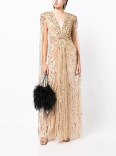 Jenny Packham Lotus Lady sequin-embellished Cape Gown - Farfetch Luxury V-neck Gown With Sequins, Luxury V-neck Sequined Gown, Luxury Sequined V-neck Gown, Luxury V-neck Evening Dress With Sequins, Luxury Sequin V-neck Evening Dress, Luxury Embellished Gown With Cape Sleeves, Glamorous Gown With Sequins And Cape Sleeves, Glamorous Sequined Gown With Cape Sleeves, Luxury Sequined Dresses With Cape Sleeves