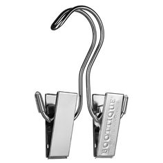 a pair of metal clips on a white background