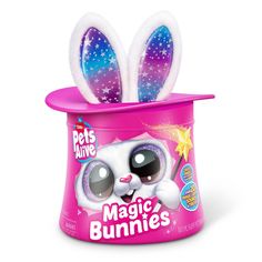 a pink plastic cup with some bunny ears on it's top and the words magic bunnies written in white