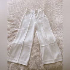 Not Full Length. Never Worn. Had These For A While And Now They’re Too Small. Beautiful And Flattering. Will Be Tight On The Waist And Loose Through Hips And Legs White Stretch Ankle-length Wide Leg Pants, White Ankle-length Summer Pants, White Summer Ankle-length Pants, Summer Stretch White Pants, Chic White Pants For Day Out, Off White Wide Leg Pants For Spring Workwear, White Stretch Straight Bottoms, White Stretch Straight Pants, White Stretch Wide Leg Pants With Pockets