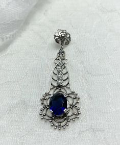 Blue sapphire lavaliere pendant, with three pearls above the gemstone and fancy filigree Floral Filigree, Deep Blue Color, Blue Sapphire Gemstone, Seed Pearl, Blue Necklace, Deep Colors, Sapphire Blue, Sapphire Gemstone, Victorian Era