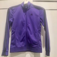 Adidas Purple Jacket Size Xs. Never Worn. Purple Hooded Track Jacket For Winter, Purple Casual Track Jacket For Fall, Purple Winter Hooded Track Jacket, Casual Purple Track Jacket For Fall, Purple Hooded Track Jacket For Sports, Sporty Purple Track Jacket For Fall, Fitted Purple Outerwear For Streetwear, Fitted Adidas Winter Track Jacket, Purple Track Jacket For Fall Sports