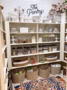 an organized pantry with baskets and food items