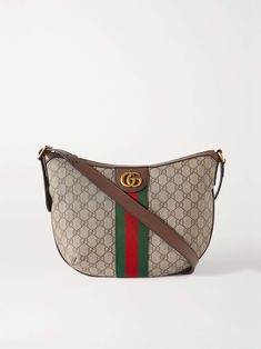 Gucci Canvas Bag With Adjustable Strap, Gucci Coated Canvas Crossbody Shoulder Bag, Gucci Canvas Shopping Bag, Gucci Coated Canvas Satchel Shoulder Bag, Luxury Coated Canvas Shoulder Bag With Gold-tone Hardware, Luxury Shoulder Bag With Gold-tone Hardware And Coated Canvas, Gucci Shoulder Bag With Detachable Strap In Coated Canvas, Designer Gucci Shoulder Bag, Gucci Shoulder Bag With Adjustable Strap For Shopping