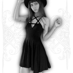 Silhouette: A-LINE Neckline: Halter Sleeve Style: Spaghetti Strap Decoration: Hollow Out Style: Gothic Dresses Length: Above Knee, Mini Material: Polyester Material: Spandex Sleeve Length(cm): Sleeveless Waistline: Natural Pattern Type: Solid Pentagram Dress - Be a little bad. This deep black dress features a beautiful pentagram neckline, designed to make you feel like a goddess. It has a high-low hemline, with a zipper closure at the back. This dress is made of soft, comfortable fabric, and is Black Strappy Mini Dress For Summer, Black Stretch Mini Dress With Crisscross Straps, Gothic Black Mini Dress With Straps, Fitted Strappy Halter Dress For Summer, Gothic Mini Dress For Summer, Gothic Mini Dress With Spaghetti Straps For Spring, Gothic Spring Mini Dress With Spaghetti Straps, Summer Gothic Mini Dress, Edgy Sleeveless Stretch Dress