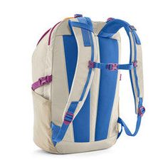 a blue and white backpack with straps on the front, back and side pockets open