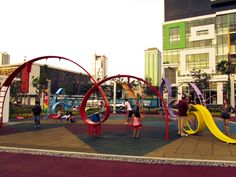 children playing in an outdoor playground area