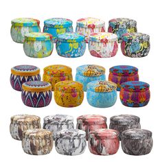 many different colored and patterned jars with designs on them