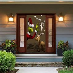 an image of christmas decorations on the outside of a house with santa's hat and deer