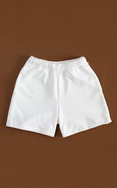 Cozy and consciously made, our 100% Organic Traceable Cotton Sweatshorts are the perfect intersection of sustainability and street style. LEARN MORE → certified organic fibre→ free from toxic substances like bleach & formaldehyde→ colored with nontoxic dyes→ water and energy are monitored→ manufactured in safe working conditions MeasurementsSizes: XS, S, M, L, XL, XXLColor: Off-white SIZE CHART Solid Color Cotton Shorts, Comfortable Solid Cotton Shorts, Cotton Shorts With Solid Color, Cotton Knee-length Shorts Solid Color, Knee-length Cotton Shorts In Solid Color, Cotton High-waisted Biker Shorts, Solid Color Athletic Shorts With Relaxed Fit, Relaxed Fit Solid Color Athletic Shorts, Knee-length Cotton Shorts Solid Color