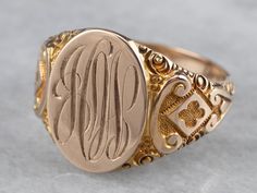 This antique Ostby Barton signet ring is stunning! Deeply carved designs along the shoulders form ornate textures, enhanced by a granulated finish that gives the 10k gold a luxurious look. We've left the original monogram – a stylish hand engraved French script! Please note that this signet ring has its original monogram, and unfortunately, this piece cannot be altered without affecting the quality of the piece. Please feel free to contact us to help you find your perfect signet ring in your sty Mens Gold Signet Rings, Custom Signet Ring, French Script, Signet Ring Men, Signet Rings, Cameo Ring, Gold Signet Ring, Carved Designs, Ring Antique