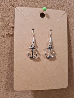 "Show everyone how anchored in life you are with these!  They have fish hook posts with the stoppers on the back to prevent loss.  The entire earring is approximately 1.5\" in length.  These are handmade and packaged.  Please let me know if you have any questions or interest in this item or any others." Casual Metal Earrings With Ear Wire, Adjustable French Hook Earrings As Gift, Fish Hook Drop Earrings As A Gift, Drop Earrings Jewelry With Fish Hook As Gift, Casual Adjustable Nickel-free Earrings, Casual Dangle Hoop Earrings As Gift, Casual Dangle Hoop Earrings For Gift, Silver Adjustable Fish Hook Earrings, Adjustable Dangle Jewelry With Fish Hook