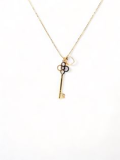 This elegant gold-plated necklace with a key and a beautiful heart-shaped pearl will open anyone's heart. The long chain is crafted with a 1.5” key that unlocks a delicate 1/2” heart, creating an exclusive piece to be treasured for years to come. Invite your loved one to unlock your heart - gift this timeless symbol of love. Elegant Key Pendant Necklace, Elegant Heart-shaped Key Jewelry, Elegant Heart-shaped Necklace With Two Keys, Elegant Two Keys Necklace As Gift, Elegant Two Keys Necklace Gift, Elegant Two Keys Necklace For Gift, Classic Jewelry With Keys For Gifts, Luxury Gold Jewelry With Keys, Heart Shaped Two Keys Necklace For Anniversary