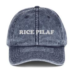 This rice pilaf dad hat is the perfect accessory for every day. The vintage-style hat is unique and weird, making it a funny gift for any occasion, ideal for the rice lover in your life. The adjustable back ensures the perfect fit and is great for everyday style. Wear it, love it, and make a statement.• 100% cotton twill• 6-panel unstructured cap• 6 sewn eyelets• Black sweatband• Metal snap buckle with an antique brass finish Vintage Baseball Hats, Statement Hat, Bride Hat, Elegant Embroidery, Vintage Cap, Carbon Neutral, Las Vegas Strip, Dad Caps, Vintage Baseball