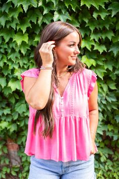 DETAILS How sweet is this babydoll blouse? With a flowy fit, textured details, function white buttons, and cute ruffle cap sleeves, this adorable top will be a cute change in your closet. Pair with denim shorts or white jeans for a fresh look! FIT TIP: True to size! Cassidy is wearing a small [5'2", 135 lbs, hourglass shape] BRAND: Wishlist Apparel Functional buttons Ruffle trim sleeves Textured details 100% Rayon CARE INSTRUCTIONS Hand wash, lay flat to dry