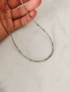 W H A T ∙ M A K E S ∙ T H I S ∙ S P E C I A L This gorgeous necklace is the perfect piece to add a touch of elegance to any outfit. The Necklace can be worn on it's own or can easily be layered with other chokers and necklaces. Wear this to any occasion and be ready to shine! This item is also referred to as LOVE necklace. The necklace is available in 18k gold filled or 925 Sterling silver. An extender chain means it adjusts to fit different sizes (37-41cm). - we use only the finest quality mate Adjustable Labradorite Gemstone Bead Necklace, Adjustable Labradorite Necklaces With Round Beads, Labradorite Beaded Round Necklaces, Everyday Jewelry With Gemstone Beads And Labradorite, Everyday Jewelry With Labradorite Gemstone Beads, Everyday Labradorite Jewelry With Gemstone Beads, Faceted Labradorite Round Beads Jewelry, Elegant Labradorite Beaded Necklace For Gift, Faceted Labradorite Beads For Crafting