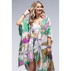 "Drape yourself in elegance with our kimono, adorned with tulip and lily flower prints. This beautiful and stylish piece achieves a perfect balance with its contrast colors   Material: 100% Viscose   *Approx. L 38\" W 40\"   We do accept returns and exchanges within thirty days. Buyer is responsible for all shipping charges and a restocking fee may apply." Western Aztec, Orange Scarf, Animal Print Scarf, Coachella Festival, Cashmere Color, Lily Flower, Purple Fashion, Floral Flower, Beautiful Crochet