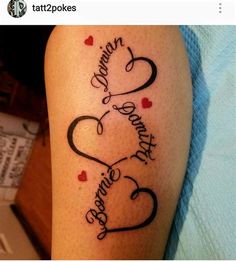 a couple of tattoos that are on someone's leg and one has the word love written