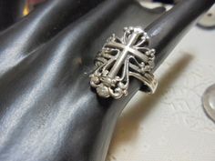 STERLING SILVER CROSS RING BAND IN BACK NEEDS REPAIR,IS BROKE . 7/8 in. by 1/2 in. FRONT BAND , PETITE RING CHECK OUT PICS ,SZ 6 1/2 CHECK OUT PICS , BAND IS BROKE IN BACK PREOWNED / vintage /sterling silver tarnishes may need cleaning THANKS Adjustable Cross Rings With Spiritual Style, Adjustable Cross Shaped Spiritual Rings, Cross Rings, Final Boss, Orthodox Cross, Petite Ring, Dope Jewelry, Cross Ring, Sterling Silver Cross