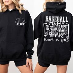 Personalized Baseball Mom Hoodie,Custom Name Baseball Hoodie,Baseball Season Hoodie,Game Day Hoodie,Sports Mom Hoodie,Custom Baseball Hoodie ### About Our Products -Youth hoodies do not include drawstrings for added safety. 🚫✨ - Our garments are crafted from a blend of 50% Cotton and 50% Polyester, ensuring both comfort and durability. - The medium-to-heavy weight fabric ensures long-lasting wear. - For your convenience, a tear-away label is included. - It provides a loose, comfortable fit that Fall Sports Fan Hoodie With Letter Print, Sports Fan Letter Print Hoodie For Fall, Black Hoodie With Letter Print For Game Day, Game Day Hoodie With Letter Print, Game Day Hooded Sweatshirt With Letter Print, Sports Season Hoodie With Letter Print For Sports Events, Fleece Hoodie With Letter Print For Sports Events, Varsity Hoodie With Letter Print For Sports Events, Pre-shrunk Black Hoodie For Sports Season