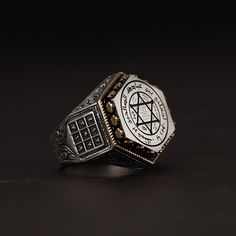 Experience the epitome of sophistication with our Luxury 925 Sterling Silver Men's Ring. Weighing approximately 20 grams, this magnificent piece features the iconic Solomon's Seal engraved atop, surrounded by intricately hand-engraved motifs and the mystical Abjad (Ebced) chart on its sides. Each detail is meticulously crafted to offer a piece that is not only a jewel but a masterpiece of art and symbolism. Ideal for collectors and enthusiasts of unique, meaningful jewelry, this ring combines el Desired Features, Solomons Seal, Sterling Silver Mens Rings, Meaningful Jewelry, Mens Silver Rings, Sterling Silver Mens, Men's Ring, Silver Man, Hand Engraving