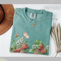 "Farmers Market Graphic Tee, Strawberries Shirt, Kawaii CLothing, Strawberry Shirt, Strawberry Festival t-shirt, Aesthetic Shirt Strawberry, Kawaii Strawberry, Strawberry Print Shirt, Vintage Strawberries Shirt, Comfort Color, Strawberry Jam Shirt, Boho Wildflowers t-shirt, Wildlfowers Shirt, Boho Floral t-shirt, Spring Tees, Boho Spring t-shirt, Pressed Flowers Shirt, Falls Shirt, Autumn Shirts, Spring Floral shirts, Pastel Flower Shirt, Botanical Shirt, Wild Flowers T shirt, cottagecore clotin Strawberry Kawaii, Farmers Market Shirt, Autumn Shirts, Vegan T Shirt, Strawberry Festival, Kawaii Strawberry, Strawberry Shirt, Spring Tees, Floral Shirts