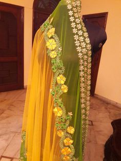 This lehenga is made in dupion silk with full handwork thread embroidery. The dupatta of this outfit has 2 options, one with Single color with single border embroidery( as on model) and Second option with double colour with 2 Borders of embroidery (as on dummy). Yellow Colour Combinations, Duptta Design, Haldi Function Dress, Yellow Combination, Yellow Color Combinations, Classroom Background, Green Dupatta, Combination Dresses, Function Dresses