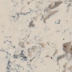 an image of white marble with brown spots